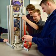 Students from Paul M. Rady Department of Mechanical Engineering with compatible antenna