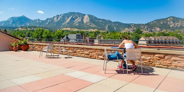 Student studying on the UMC rooftop