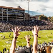 Fans cheering on the Buffs at the spring football game