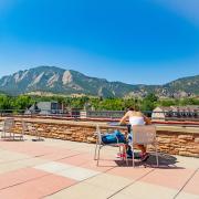 Student studying on the UMC rooftop